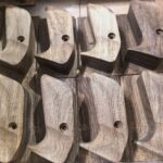 Metal recurve bow grip
