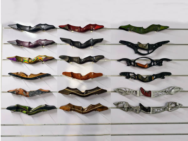 Custom bow risers in laminated wood and carbon fiber